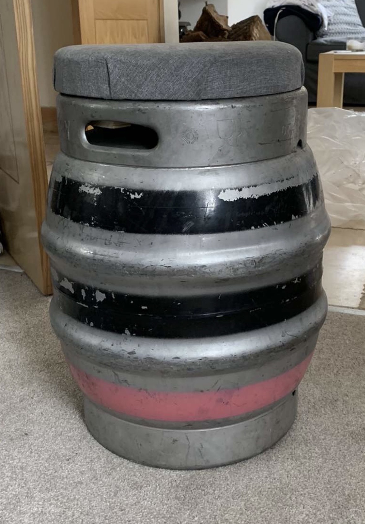 Grey fabric keg seat indoors
